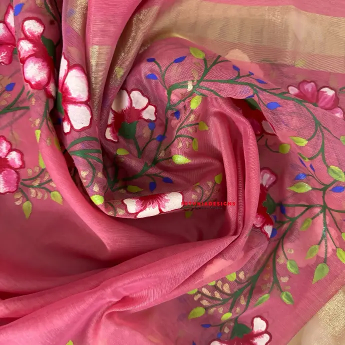 Gold-Bordered Dupatta with Hand-Painting Floral hand-painted kurta paired with a gold-bordered dupatta.